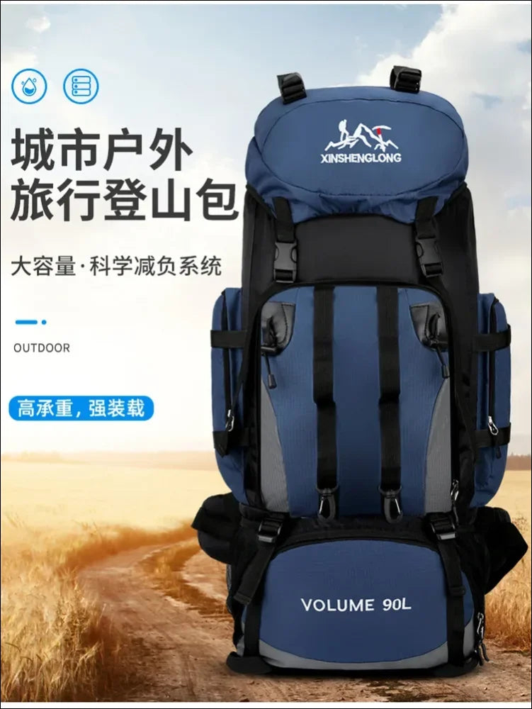 Blau-schwarzer wanderrucksack mit mehreren fächern und riemen.