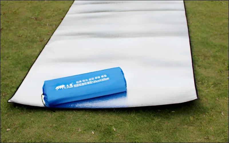 Waterproof, aluminum-coated tent floor mat in various sizes