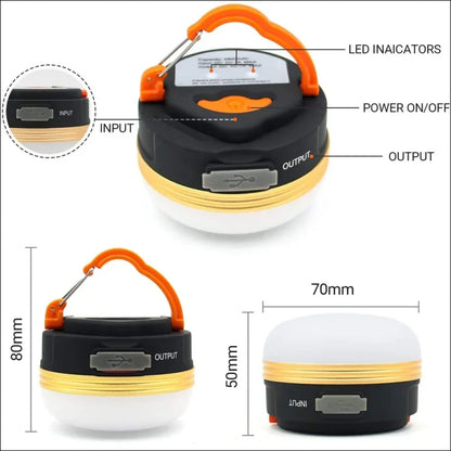 Tragbare led-campinglaterne mit usb-eingangs-/ausgangsanschlüssen und einem aufhängegriff.