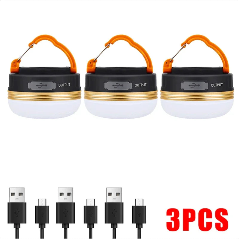 Tragbare led-camping-laternen mit orangefarbenen aufhängehaken und usb-ladekabel.