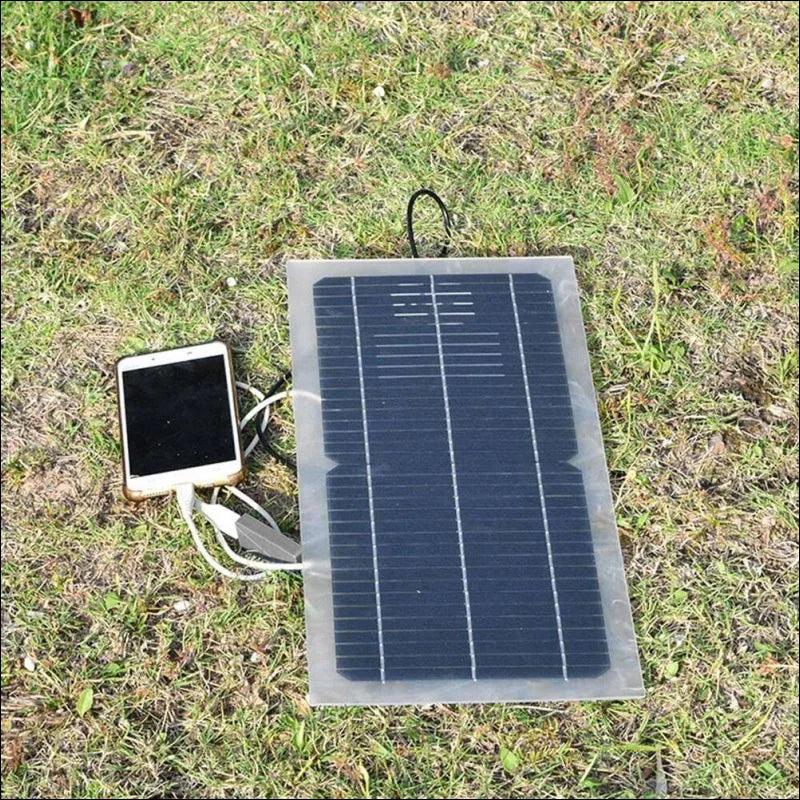 Energie überall: solar telefon ladegerät mit handy auf solarpanel für unterwegs