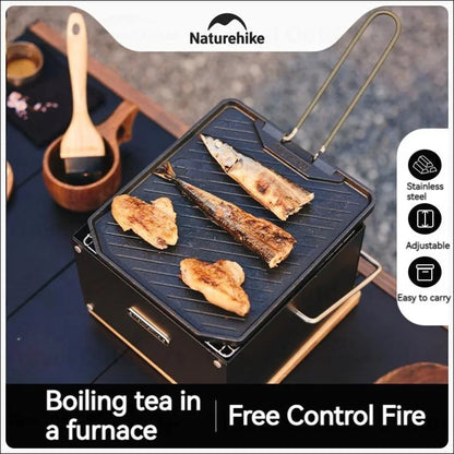 Zwei fische auf einem smart design edelstahl grill mit holzlöffel