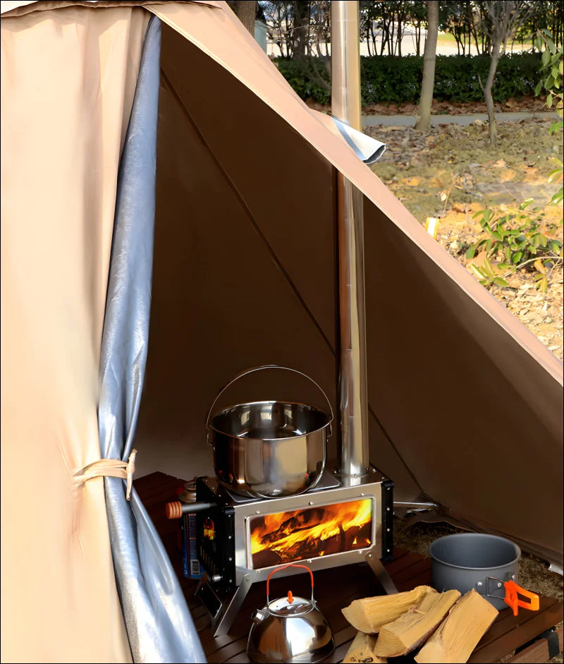 Erleben sie outdoor-kochen mit einem ultraleichten holzofen und einem topf im zelt