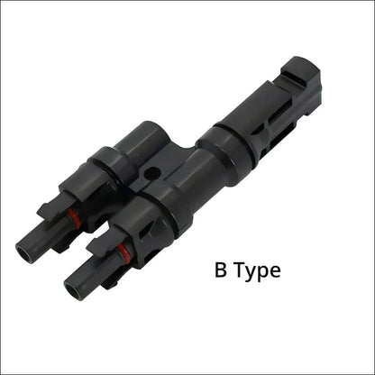 Ein paar schwarzer kunststoffstecker mit roten und schwarzen kabeln für solar y stecker verbinder